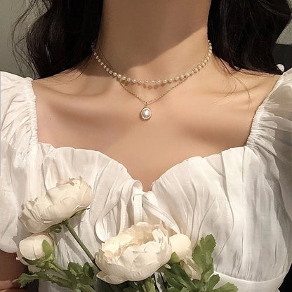 Love Stitching Pearl Japanese And Korean Necklace Design High-grade Light Luxury Niche Clavicle Chain New Women\'s Necklace