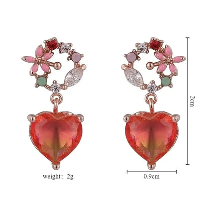 1 Pair Elegant Lady Streetwear Water Droplets Heart Shape Flower Hollow Out Inlay Steel Imitation Pearl Zircon Drop Earrings