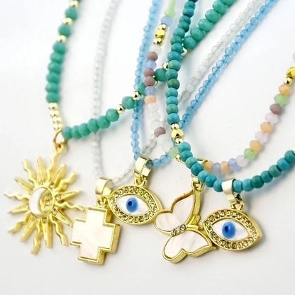 2 Pieces Elegant Lady Devil\'S Eye Butterfly 304 Stainless Steel Artificial Crystal Turquoise Gold Plated Pendant Necklace In Bulk