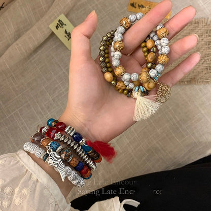 Casual Ethnic Style Round Tree Wings Pu Leather Wooden Beads Bodhi Beaded Braid Women's Bracelets
