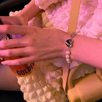 Fashion Heart Shape Flower Alloy Titanium Steel Plating Artificial Pearls Rhinestones Women'S Bracelets