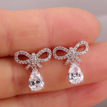 1 Pair Elegant Bow Knot Inlay Copper Alloy Artificial Pearls Zircon White Gold Plated Drop Earrings