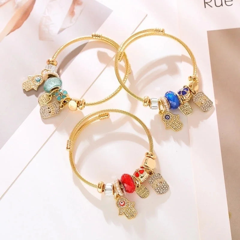 Elegant Devil'S Eye Palm 304 Stainless Steel Alloy Gold Plated Rhinestones Bangle In Bulk