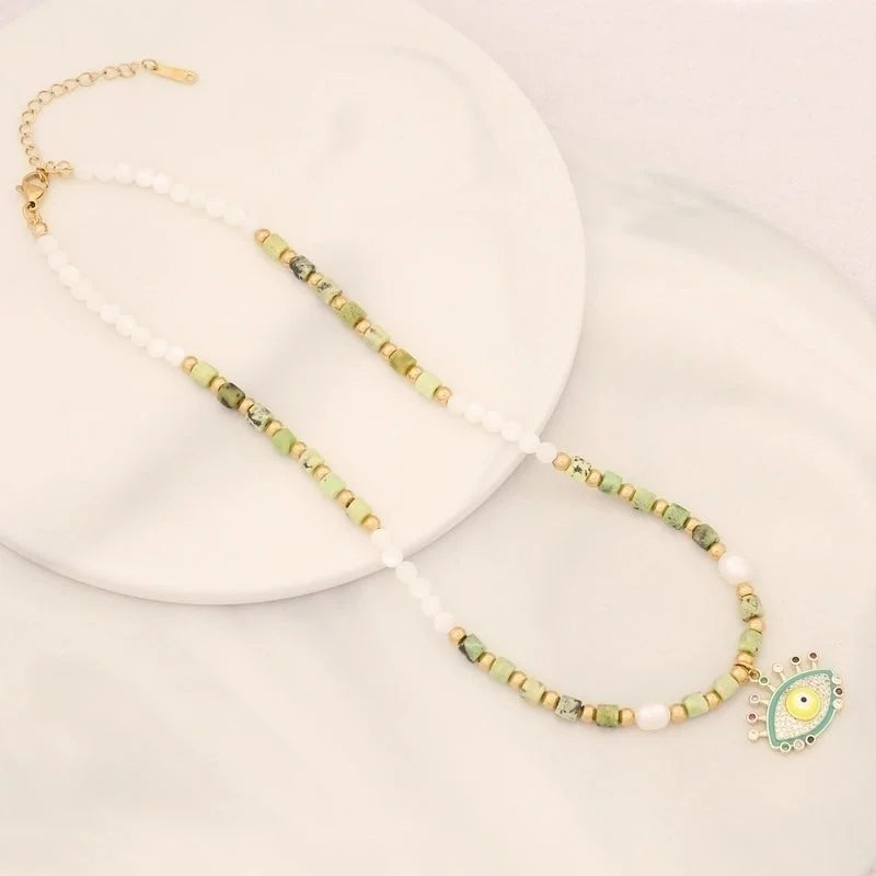 Vacation Bohemian Devil'S Eye Heart Shape Artificial Pearl Natural Stone Copper 18K Gold Plated Zircon Pendant Necklace In Bulk